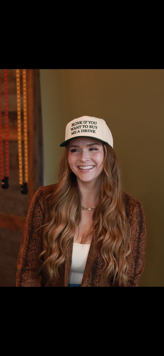 BLINK TO BUY ME A DRINK TRUCKER HAT