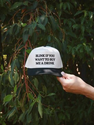 BLINK TO BUY ME A DRINK TRUCKER HAT